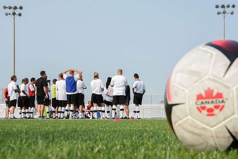 Soccer coaching session on the field